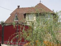 Гостевые дома Каракола - красивый коттедж "Арго" Гостевые дома Каракола - красивый коттедж "Арго"